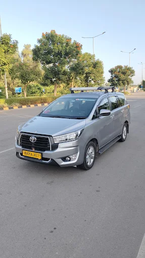 Airport taxi Bangalore — SDM Tours and Travels cab at Kempegowda International Airport"